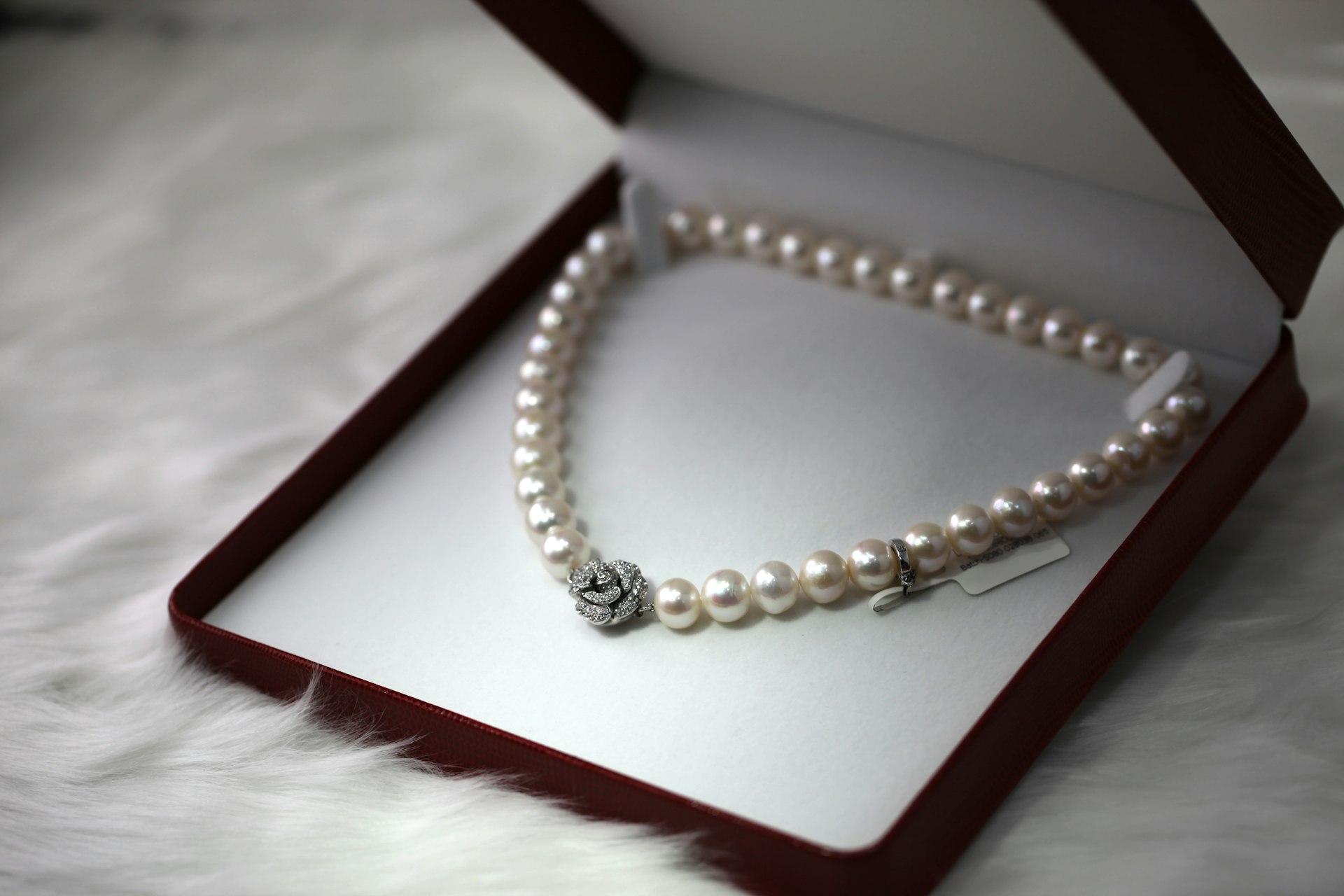 Pearl necklace in an open presentation box